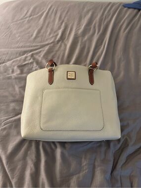 Dooney & Bourke Cream Leather Tote with Brown Trim and Gold Accent